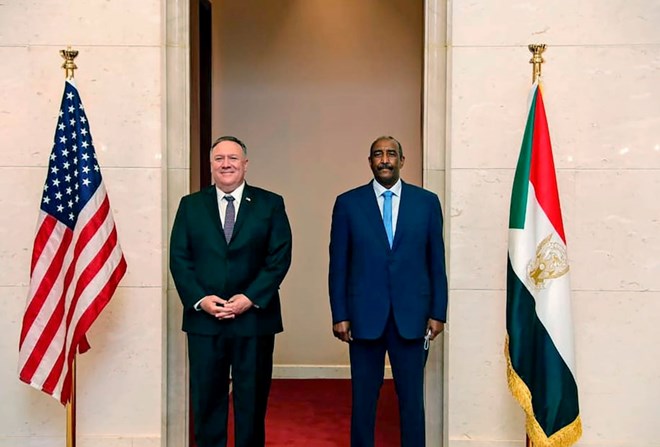Secretary of State Mike Pompeo with Lt. Gen. Abdel Fattah al-Burhan, the head of Sudan’s military council, in Khartoum on Aug. 25. (Sudanese cabinet/AP)