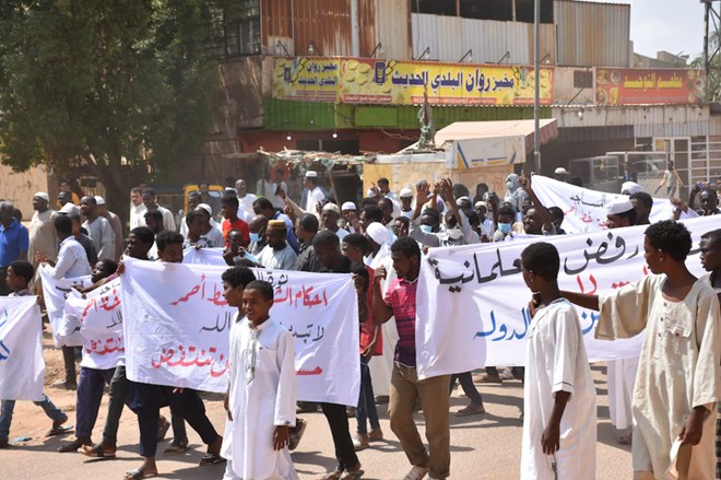 Demonstrators in the Sudanese capital of Khartoum last week protest a deal the United Arab Emirates and Bahrain agreed to with Israel to normalize relations. (Abbas M. Idris/Anadolu Agency/Getty Images)