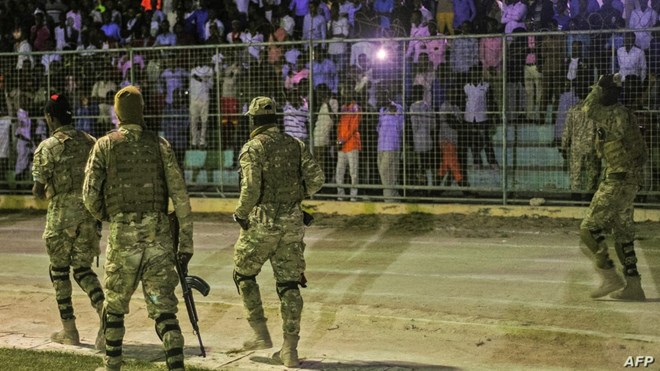 Somali security forces patrol during a soccer match at Konis Stadium, in Modadishu, Somalia, Sept. 8, 2017.