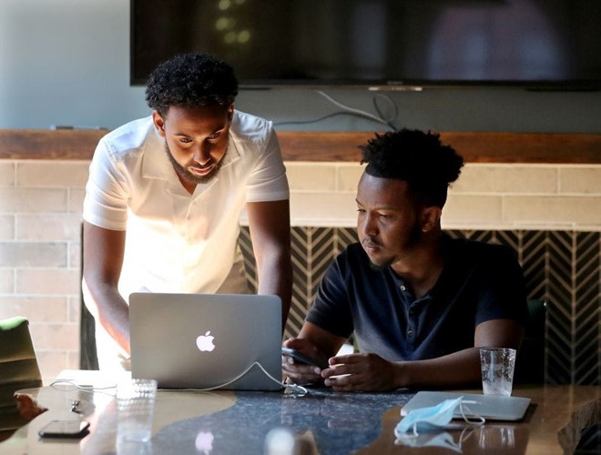Entrepreneurs Salman Elmi, left, and Abdi Hassan are co-founders of Top Figure.
— David Joles, Star Tribune