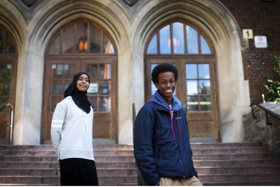 Grade 11 students Amal Absiye, left, and Hamza Bashir at Jarvis Collegiate. Grad rates among Somali students are going up thanks to special programs addressing past achievement gaps.