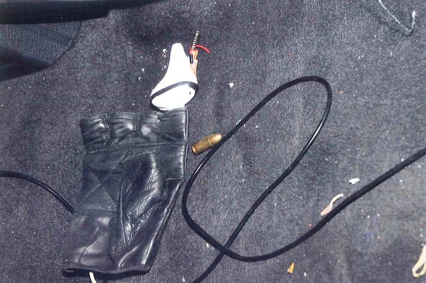 Unused bullet on floor of vehicle