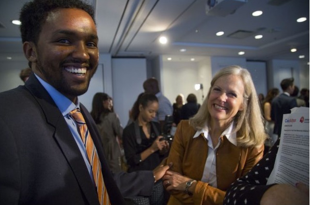 Zakaria Abdulle, with United Way president and CEO Susan McIsaac at a presentation about the benefits of a mentoring program sponsored by the charity.
