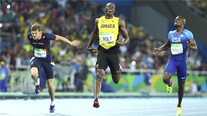 Jamaican sprinter wins third Olympic 200m gold after racing past the finish line in 19.78 seconds.
