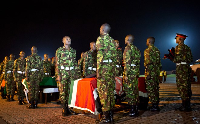 The coffins of four Kenyan soldiers at an airport in Nairobi on Monday. The soldiers were killed in Somalia when Shabab militants attacked their base.
BEN CURTIS / ASSOCIATED PRESS