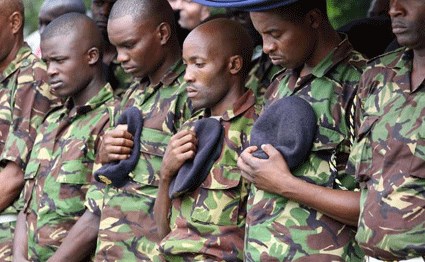 Soldiers pay tribute to their fallen colleagues at the Armed Forces Memorial Hospital in Nairobi on January 22, 2016. President Uhuru attended the ceremony accompanied by his deputy William Ruto, First Lady Margaret Kenyatta, military top brass and Cord leaders Raila Odinga, Kalonzo Musyoka and Moses Wetang’ula. PHOTO | JEFF ANGOTE
