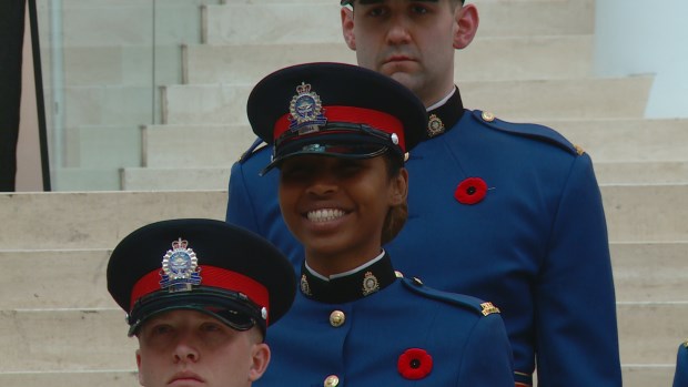Const. Amal Abdi, pictured Thursday at city hall during her graduation from the EPS academy, is the first Somali-Canadian officer on the city's police force. (Roberta Bell/CBC)