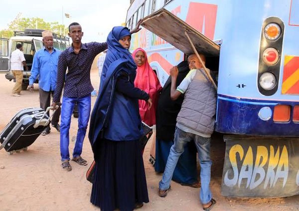 Somali refugees board a bus in Dadaab to return to Somalia on June 16, 2016. Nearly 70,000 Somalis in the refugee complex have indicated their willingness to return home soon. FILE PHOTO | JEFF ANGOTE | NATION MEDIA GROUP