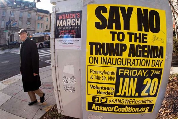 Street posters calling for protests are seen January 13, 2017, in the Dupont Circle area of Washington, DC, a week before the Inauguration of Donald Trump as US President. PHOTO | PAUL J. RICHARDS | AFP
