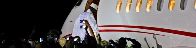 Newly-elected President Adama Barrow to return to Gambia shortly as longtime ruler leaves country for Equatorial Guinea.