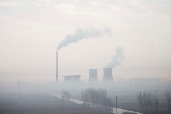 Smoke bellowing from a power plant on a polluted day in Cangzhou, some 180 kms from Beijing, in northern China's Hebei province, on November 17, 2015. Smog has put people's health in jeopardy. PHOTO | AFP