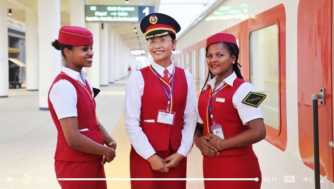 Saliha Muhammed, intern-captain of Addis Ababa-Djibouti Railway, greets passengers before the train departs./CGTN Photo