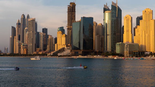 Jet skis pass by residential skyscrapers on the waterside in the Dubai Marina district in Dubai, United Arab Emirates, on Monday, June 8, 2020.
Christopher Pike | Bloomberg | Getty Images