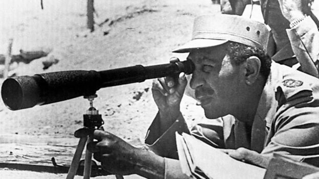 Egypt's President Anwar Sadat, who was assassinated by Islamists nearly 40 years ago, visiting army positions in 1973.GETTY IMAGES