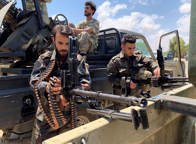 Troops loyal to Libya's internationally recognized government prepare themselves before heading to Sirte, in Tripoli, Libya, Libya July 6, 2020. REUTERS/Ayman Sahely/File Photo