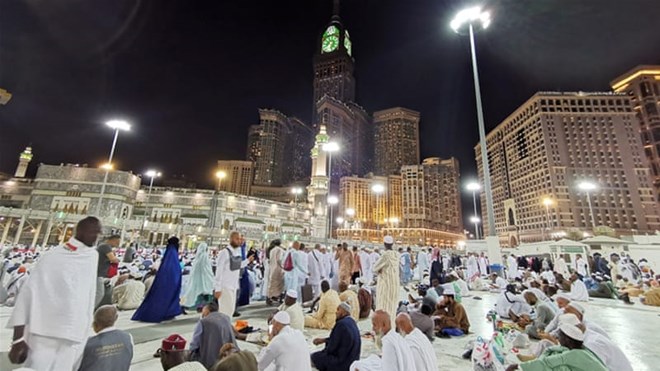Muslims pray at the Grand Mosque during the annual Hajj pilgrimage in their holy city of Mecca. Only 1,000 people will be allowed to attend this year's event because of the coronavirus [File: Waleed Ali/Reuters]
