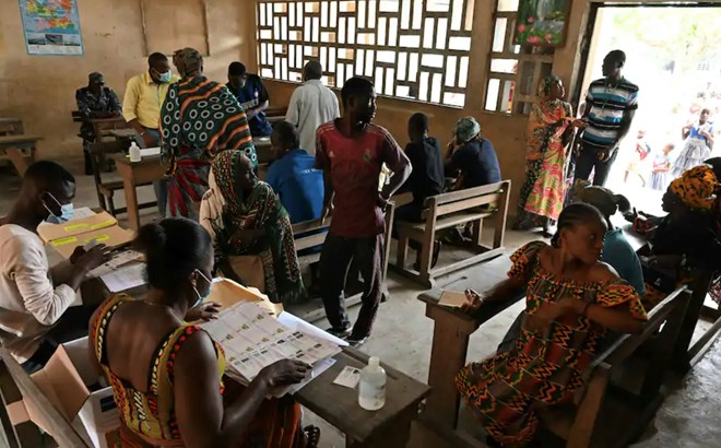 Residents line up to receive their voting cards in Abidjan, Ivory Coast, on Oct. 14. (Issouf Sanogo/AFP/Getty Images)