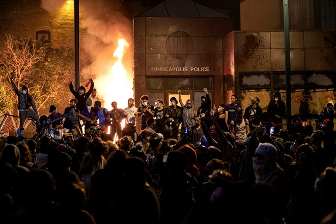 The Minneapolis Third Police Precinct is set on fire on May 28, 2020 during a third night of protests following the death of George Floyd.Carlos Gonzalez / Star Tribune via Getty Images