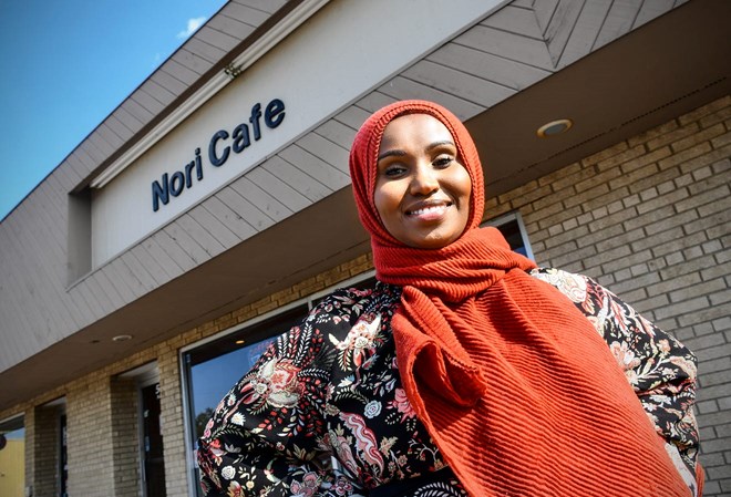 Farhiya Iman stands in front of Nori Cafe, the business she runs with her family Monday, July 22, 2019, in St. Cloud. Dave Schwarz, Dschwarz@stcloudtimes.com