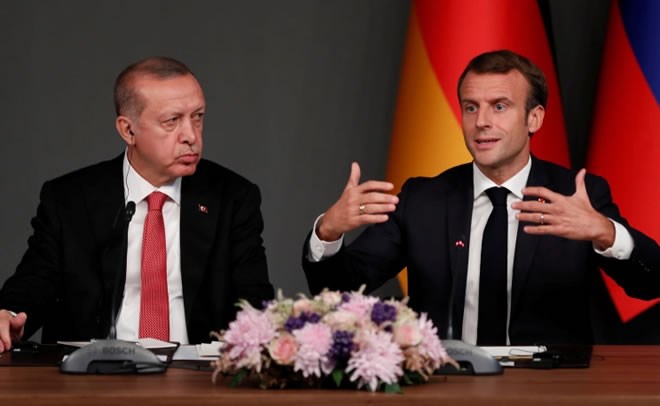 Erdogan and Macron attend a news conference after a Syria summit in Istanbul in 2018 [Murad Sezer/Reuters]