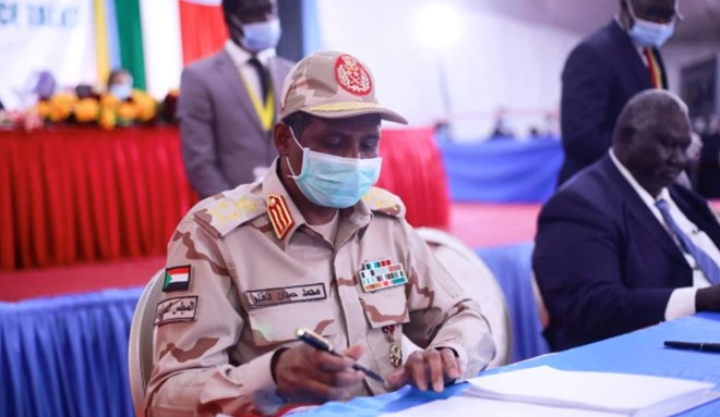 Lieutenant General Mohamed Hamdan Dagalo signed the document on behalf of the Sudanese government [Akuot Chol/AFP]