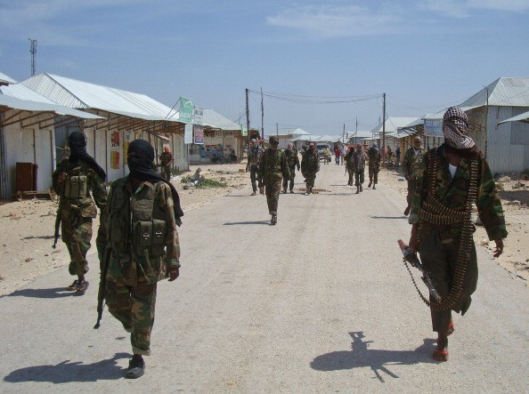 FILE PHOTO: Al-Qaeda linked Al-shabaab recruits walk down a street in the Somalian capital, Mogadishu. AFP PHOTO/Mohamed ABDIWAHAB