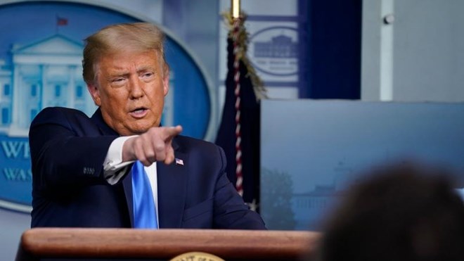 U.S. President Donald Trump speaks during a news conference in the James Brady Press Briefing Room of the White House Wednesday, Sept. 23, 2020, in Washington. (AP Photo/Evan Vucci)