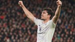 Manchester United beats Liverpool 2-1 with Maguire’s late goal in big boost for Amorim