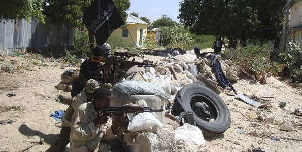 Armed militants from Somalia’s Hizbul Islam rebel group take position as they guard a roadblock in southern Mogadishu. Violence in Somalia has killed at least 21,000 people in the failed Horn of Africa nation since the start of 2007 and driven another 1.5 million from their homes.” Photo/REUTERS