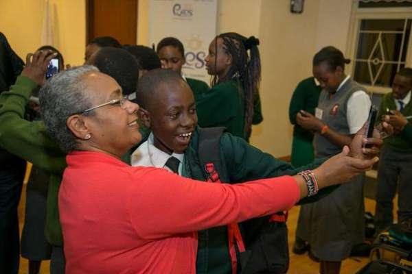 First Lady Margaret Kenyatta takes a selfie with some of the students under the Pupils Reward Scheme mentorship programme, who were hosted at State House, Nairobi, on Thursday night.