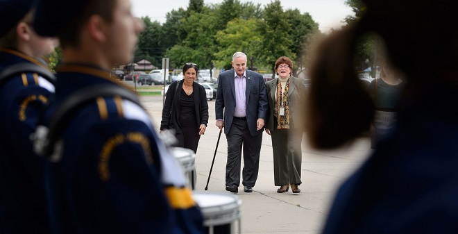 Governor Dayton was accompanied into Columbia Heights High School by Education Commissioner Brenda Cassellius, left, and Columbia Heights School Superintendant Kathy Kelly who refused to allow media to hear the Governor. A school drum corps greeted him.