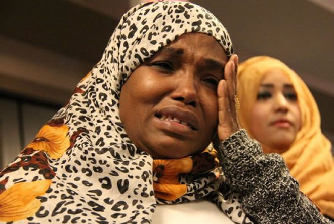 Somalian refugee Khadija Ahmed cries while talking about her now six-year-old son that she was forced to leave behind with her husband when she was offered the opportunity to move to Canada as a refugee.