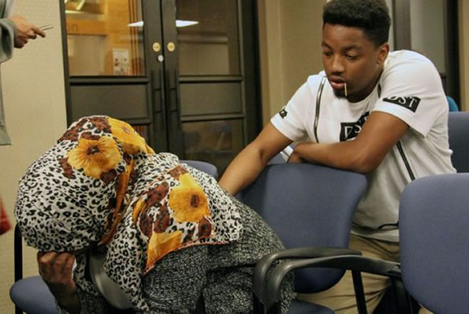 THANDI FLETCHER/METRO - Zack Abdi, 17, comforts his mother Khadija Ahmed while she cries over her young son and husband who she left behind in Somalia when she came to Canada as a refugee.