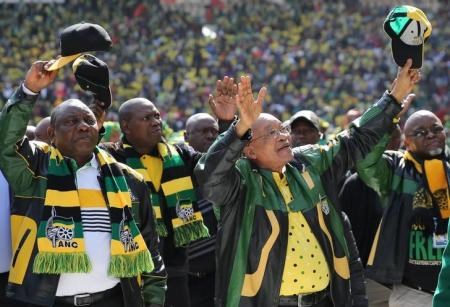 African National Congress (ANC) president,Jacob Zuma (2nd R) waves to his supporters as he arrives for the parties traditional Siyanqoba rally ahead of the August 3 local municipal elections in Johannesburg, South Africa July 31, 2016.