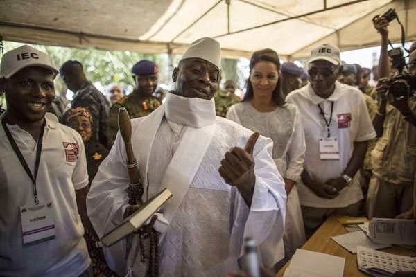Yahya Jammeh (centre) gestures before casting his vote at a polling station in the presidential election in Banjul, Gambia, on December 1, 2016. He seized power in a 1994 coup and had until now survived multiple attempts to remove him from the presidency. PHOTO | MARCO LONGARI | AFP