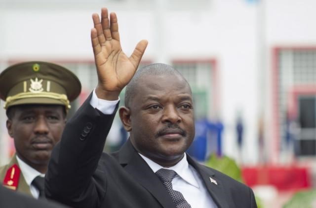 Burundi's President Pierre Nkurunziza bids farewell to his South African counterpart Jacob Zuma (not in the picture) as he departs at the airport after an Africa Union-sponsored dialogue in an attempt to end months of violence in the capital Bujumbura, February 27, 2016.
