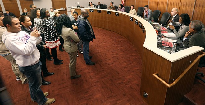 In the midst of a motion to select interim superintendent Michael Goar as the board's preferred candidate, protestors shut down the school board meeting. Tuesday January 12, 2016 in Minneapolis, MN.