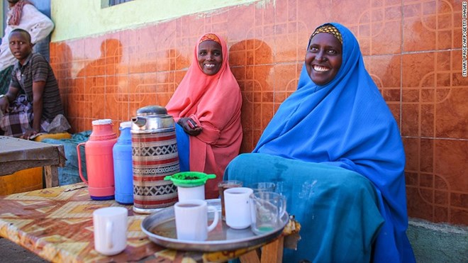 This handout photograph taken and released by the African Union-United Nations Information Support team on February 27, 2012 shows women selling tea in the central Somali town of Buur-Hakba.