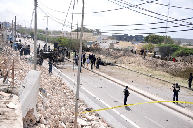 The two Vehicle Bond Improvised Explosive Devices (VBIED) blasts took place near the entrance to Halane camp in Mogadishu city leaving 13 people dead.