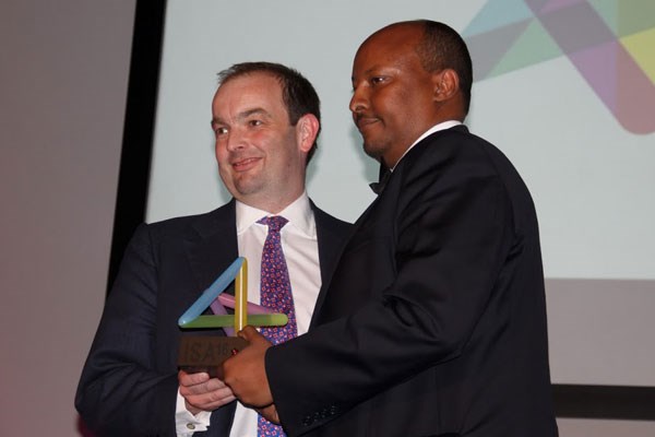 Britain's Minister for Africa James Duddridge (left) presents Dahabshiil CEO Abdirashid Duale with the Business of the Year award. PHOTO | COURTESY |