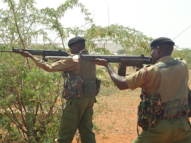 Police officers patrol in Mandera during a leader's security meeting at county offices Photo/Patrick Vidija