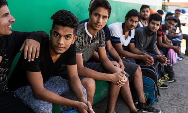 Indian migrants travelled for several months through Latin America before arriving at the immigration offices in Tapachula. Photograph: Encarni Pindado for the Guardia
