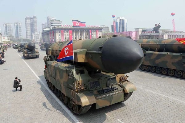 This April 15, 2017 picture released from North Korea's official Korean Central News Agency (KCNA) on April 16, 2017 shows ballistic missiles being displayed through Kim Il-Sung square during a military parade in Pyongyang marking the 105th anniversary of the birth of late North Korean leader Kim Il-Sung. PHOTO | AFP