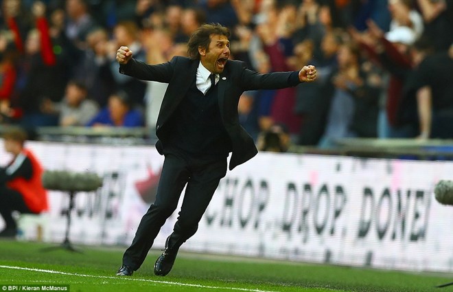 A euphoric Antonio Conte dashes down the touchline after Matic's goal sealed a 4-2 win over Spurs at Wembley on Saturday