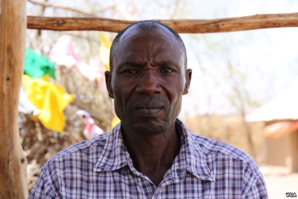 Michael Abukassin Kuku, a 48 year-old Sudanese refugee from Nuba, living in Kakuma refugee camp. Yahya was scheduled to fly from Kakuma to Nairobi on January 30, for processing before his resettlement in Tucson, Arizona, but the U.S. travel ban prevented him from doing so. He now waits for more information in Kakuma, Kenya, Feb. 6, 2017. (J. Craig / VOA)