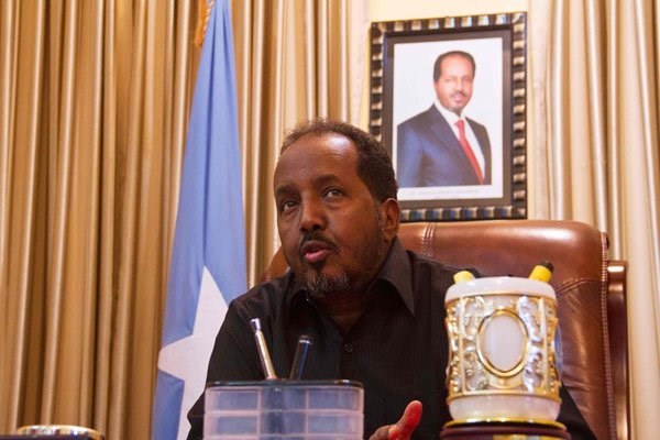 President of the Federal Republic of Somalia Hassan Sheikh Mohamud speaks to journalists during an interview at the Somali State House in Mogadishu on March 02, 2014. Somalia is due to hold its presidential election on February 8, 2017 after numerous delays. FILE PHOTO | ISAAC KASAMANI | NATION MEDIA GROUP