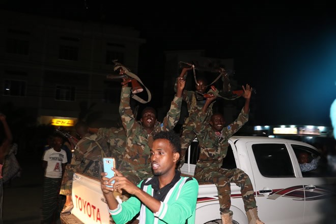 Government soldiers celebrate Mohamed Abdullahi Farmajo's win in the Somali Presidential Elections. HOL/ Dalmar Gure