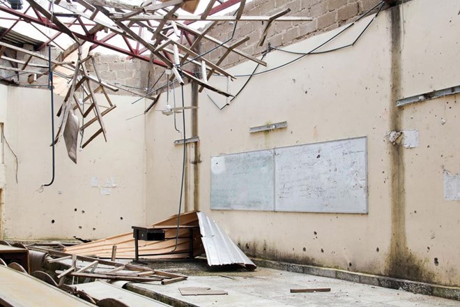 A lecture theatre at the Federal College of Education, Kano, Kano state, destroyed when Boko Haram insurgents lobbed grenades and shot students taking classes on September 17, 2014. At least 27 students and two lecturers were killed in the attack.