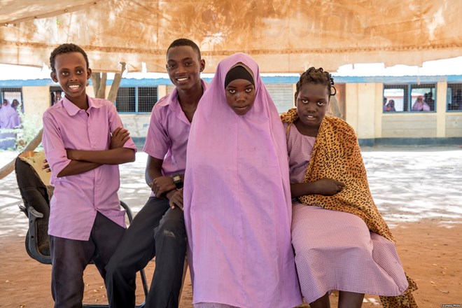 FILE - Several students at Illeys Elementary School in Kenya's Dadaab refugee camp pose for a photo. Asad Hussein (not shown), a 22-year-old raised in the camp, has been accepted at Princeton University in the United States. (Photo courtesy of CARE)