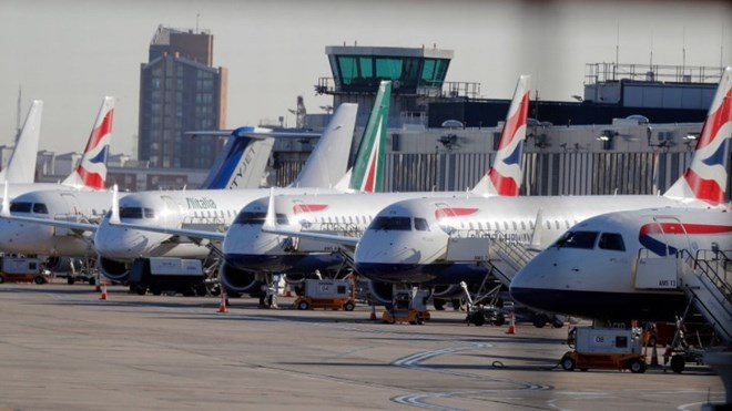 Airplanes are parked at London City Airport, where flights were canceled Monday after an unexploded World War II bomb was found nearby. (Frank Augstein/AP)